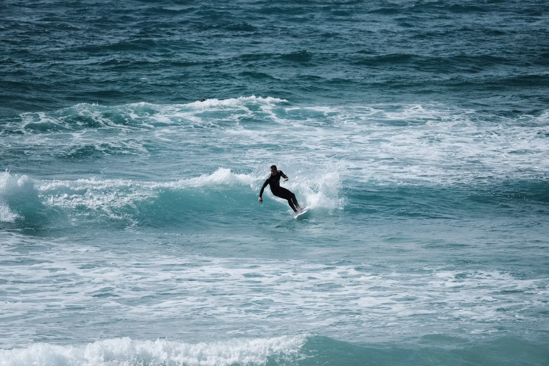 Newquay Fistral beach surfer