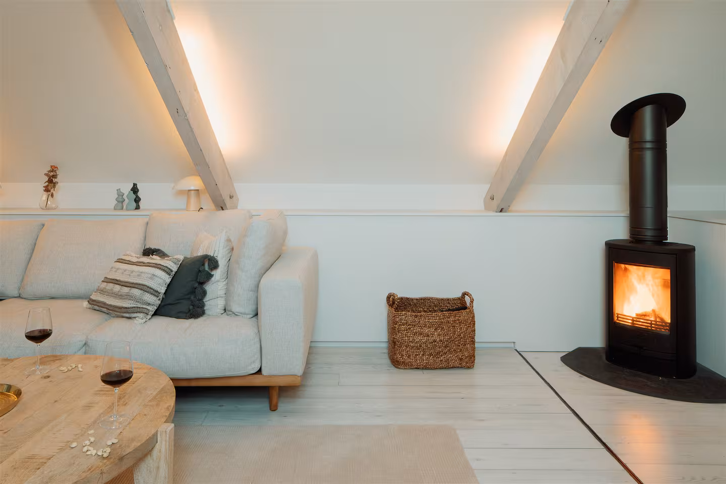 Cosy living room with wood burner in a holiday let